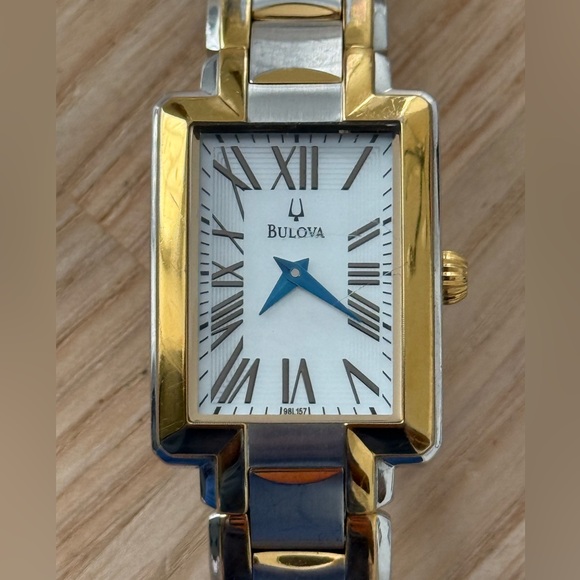Bulova Curvex Luxury Watch Two-Tone Bracelet White Rectangular Dial Blue Hands